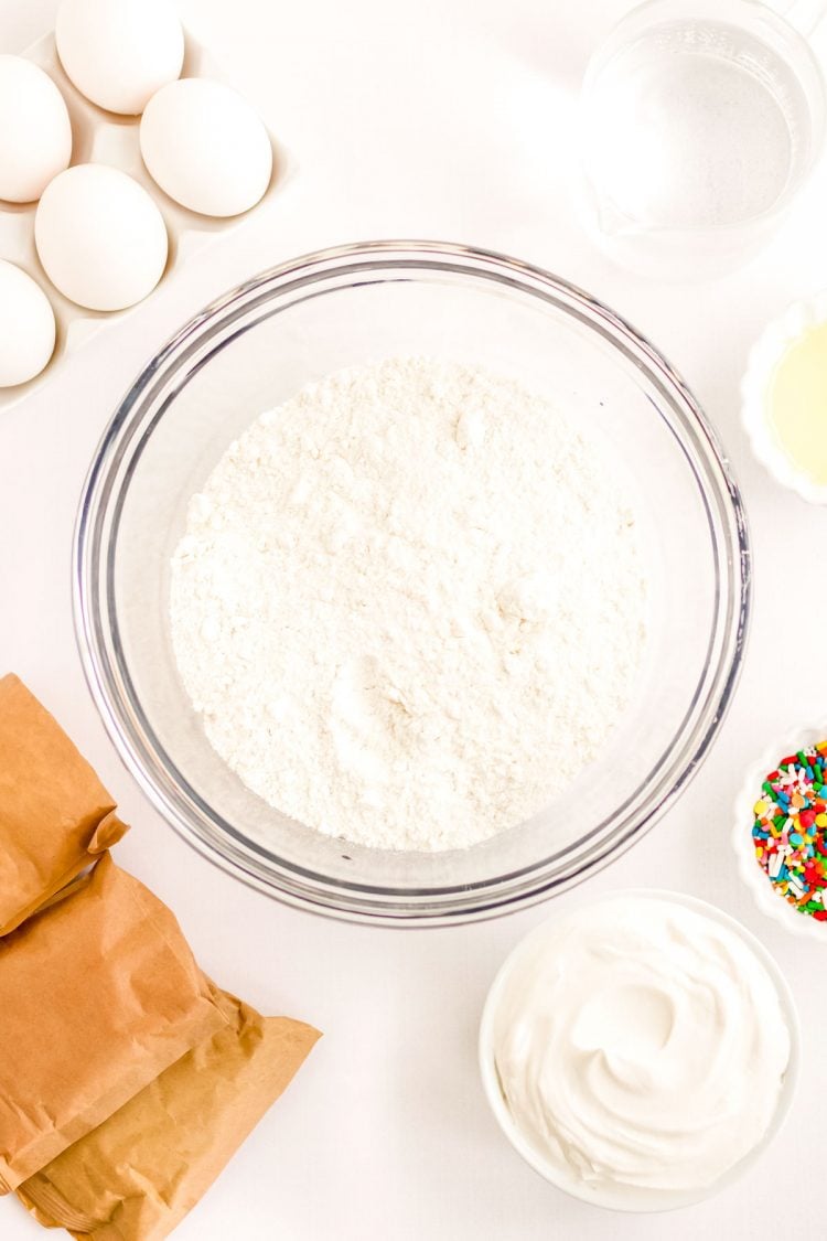 Ingredients to make rainbow jello poke cake.