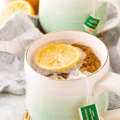 A mug filled with a homemade Starbucks medicine ball tea.