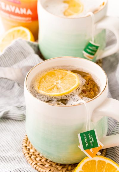 A mug filled with a homemade Starbucks medicine ball tea.