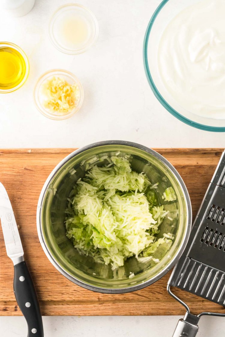 Overhead photo of ingredients to make Tzatziki sauce.