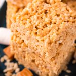 Close up photo of a stack of salted caramel rice krispie treats.