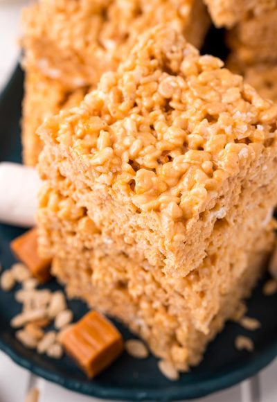 Close up photo of a stack of salted caramel rice krispie treats.