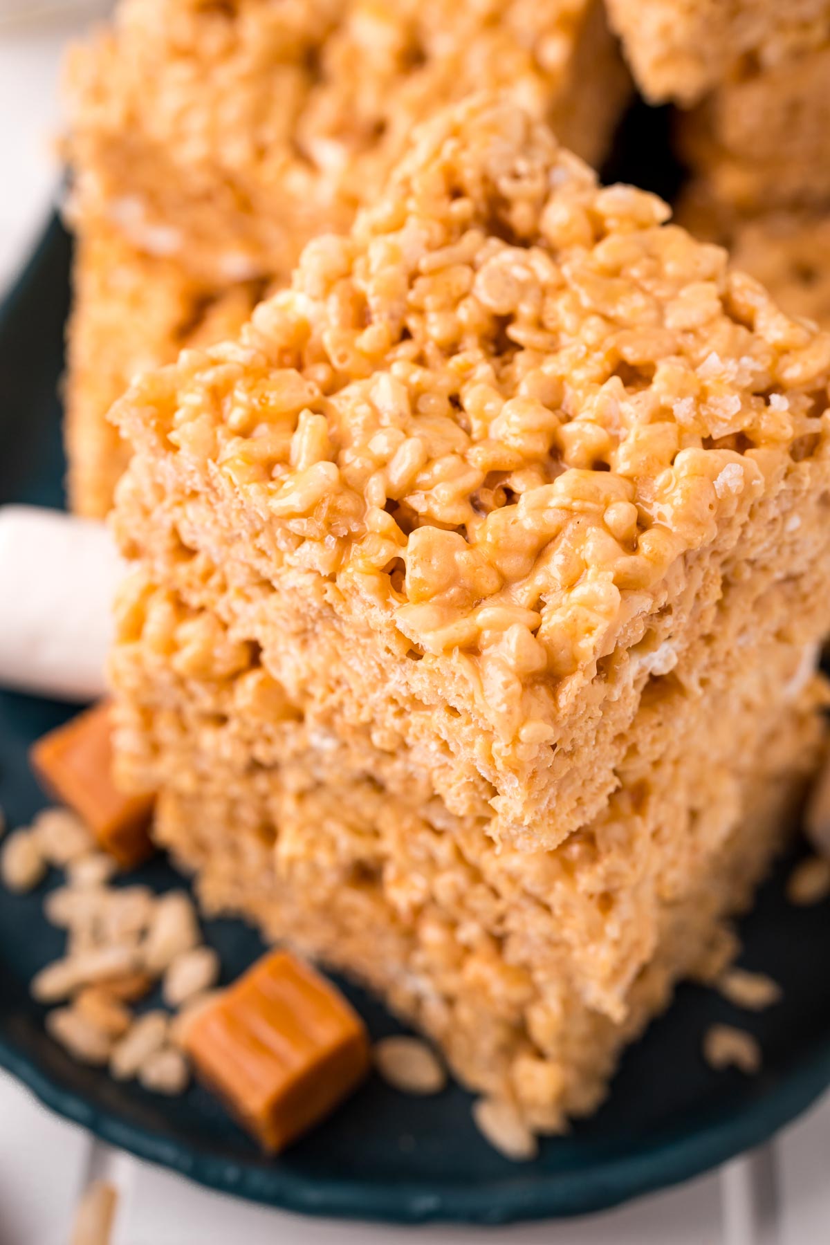 Close up photo of a stack of salted caramel rice krispie treats.