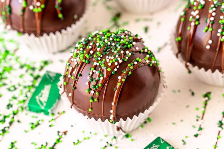 Close up photo of mint hot chocolate bombs.