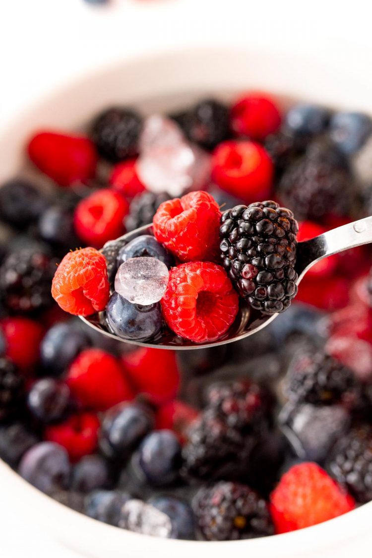 Close up photo of a spoonful of berries (nature's cereal.