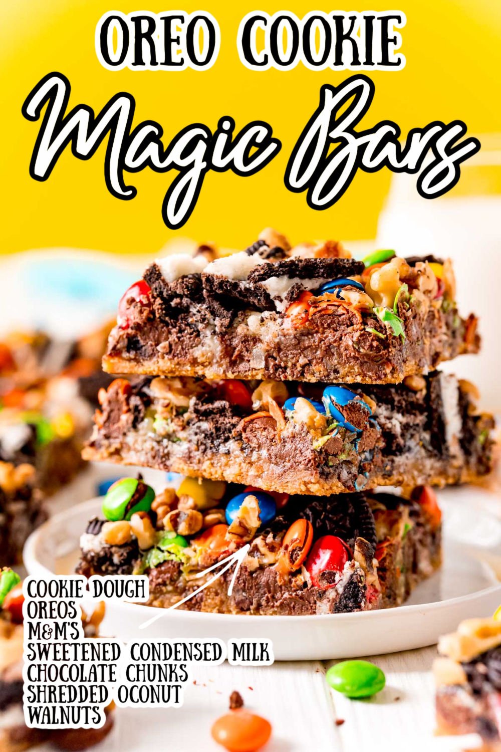 These Oreo Magic Bars have a refrigerated cookie dough base and are overflowing with Oreo cookies, chocolate chunks, coconut, nuts, and M&M's for a rich, tasty, and easy dessert! via @sugarandsoulco