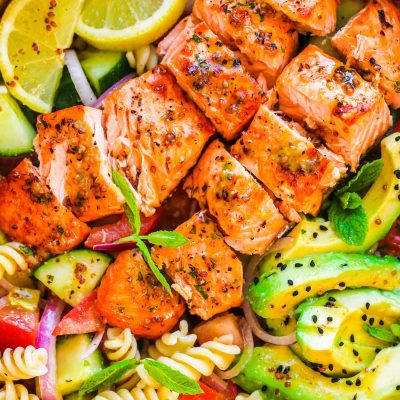 Close up photo of a salmon pasta salad.