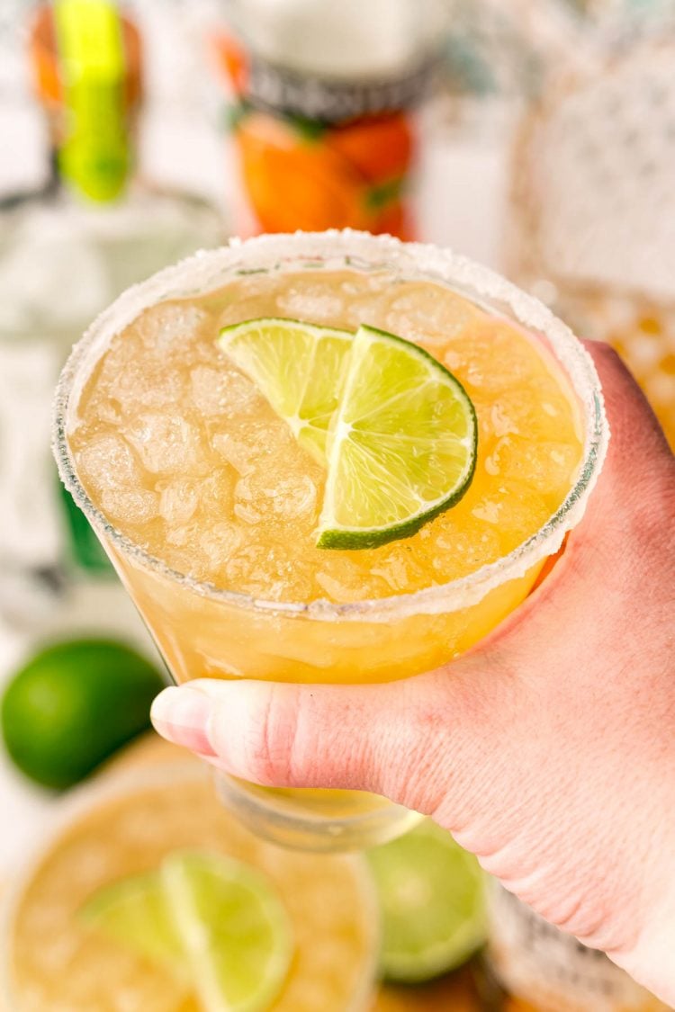 Woman's hand holding a beer margarita!
