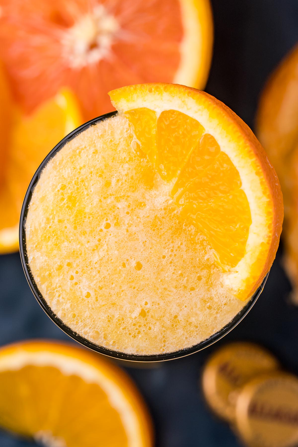 Overheard photo of a beermosa topped with a slice on orange.