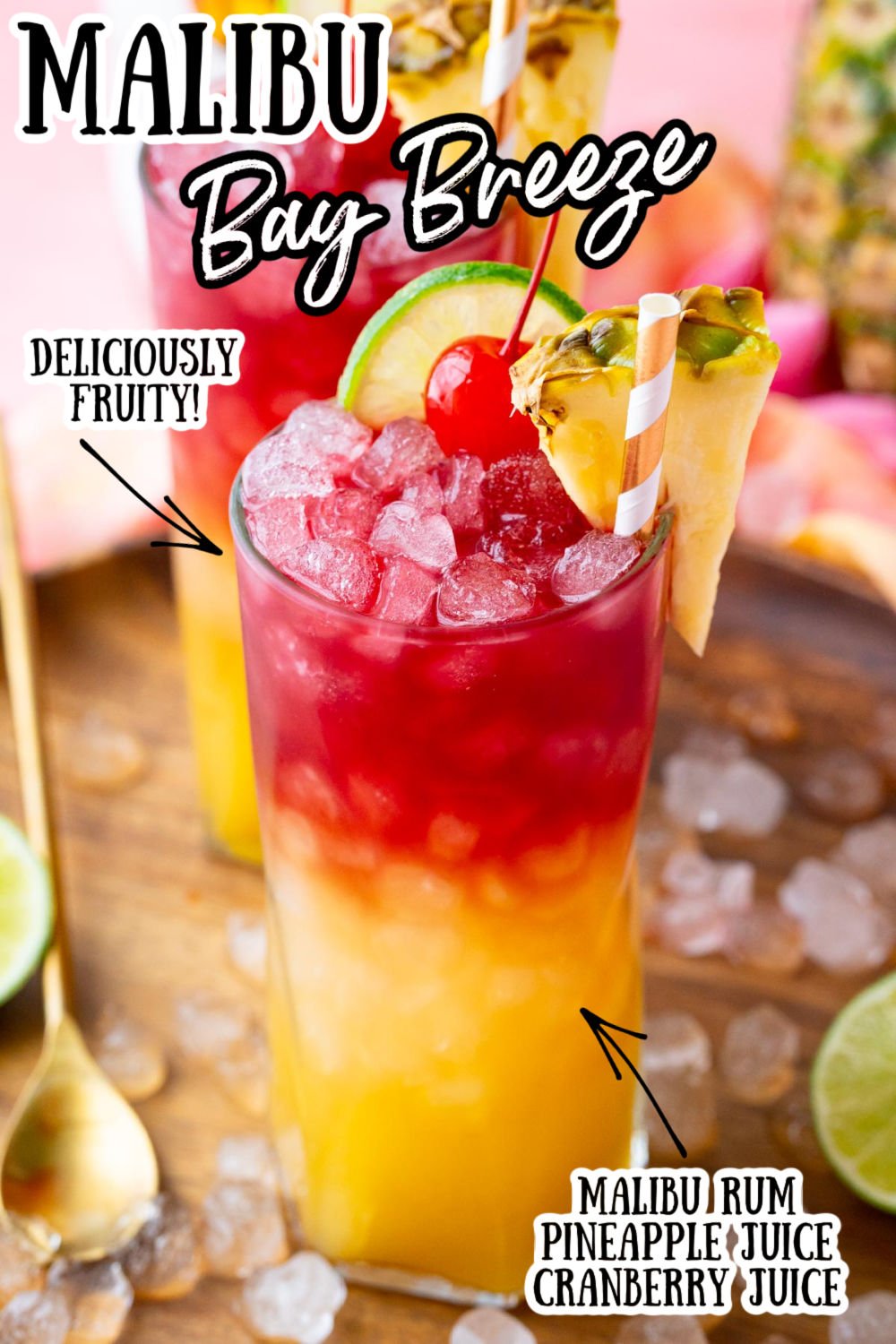 Malibu Bay Breeze is a fruity, layered cocktail bursting with the best tropical flavors! Just one sip of this refreshing drink of coconut rum, pineapple juice, and cranberry juice will have you wishing you were on island time! via @sugarandsoulco