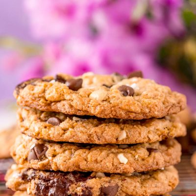 Straight on photo of a stack of five ranger cookies.