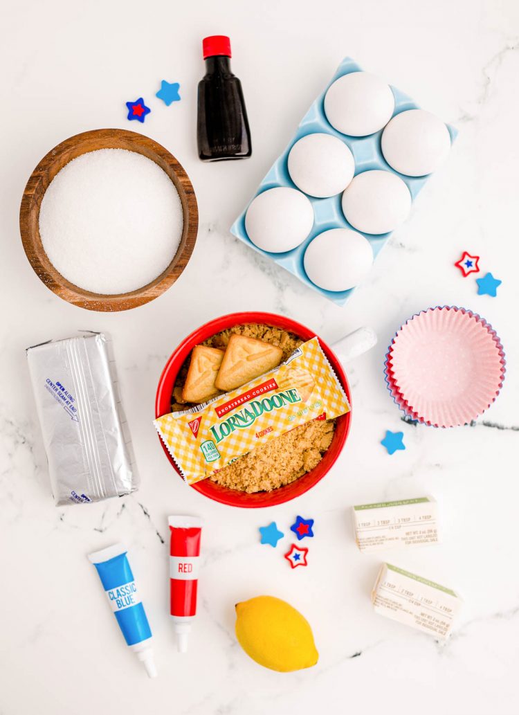 Overhead photo of ingredients prepped to make mini 4th of july cheesecakes.