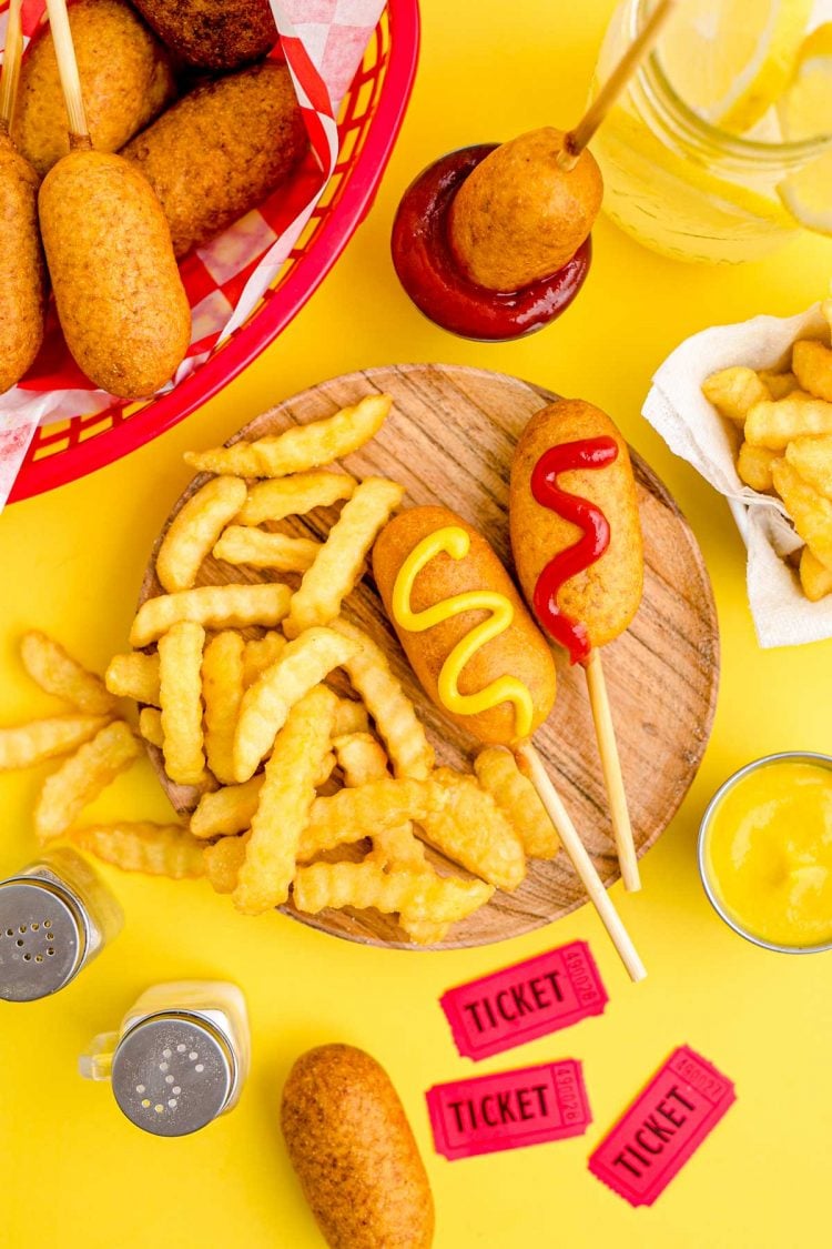 These Mini Corn Dogs take half hot dogs, roll them in a sweet, cornmeal batter, and then deep fry to golden brown perfection! Great for a weekend snack, game day appetizer, or a quick lunch your kids will love!