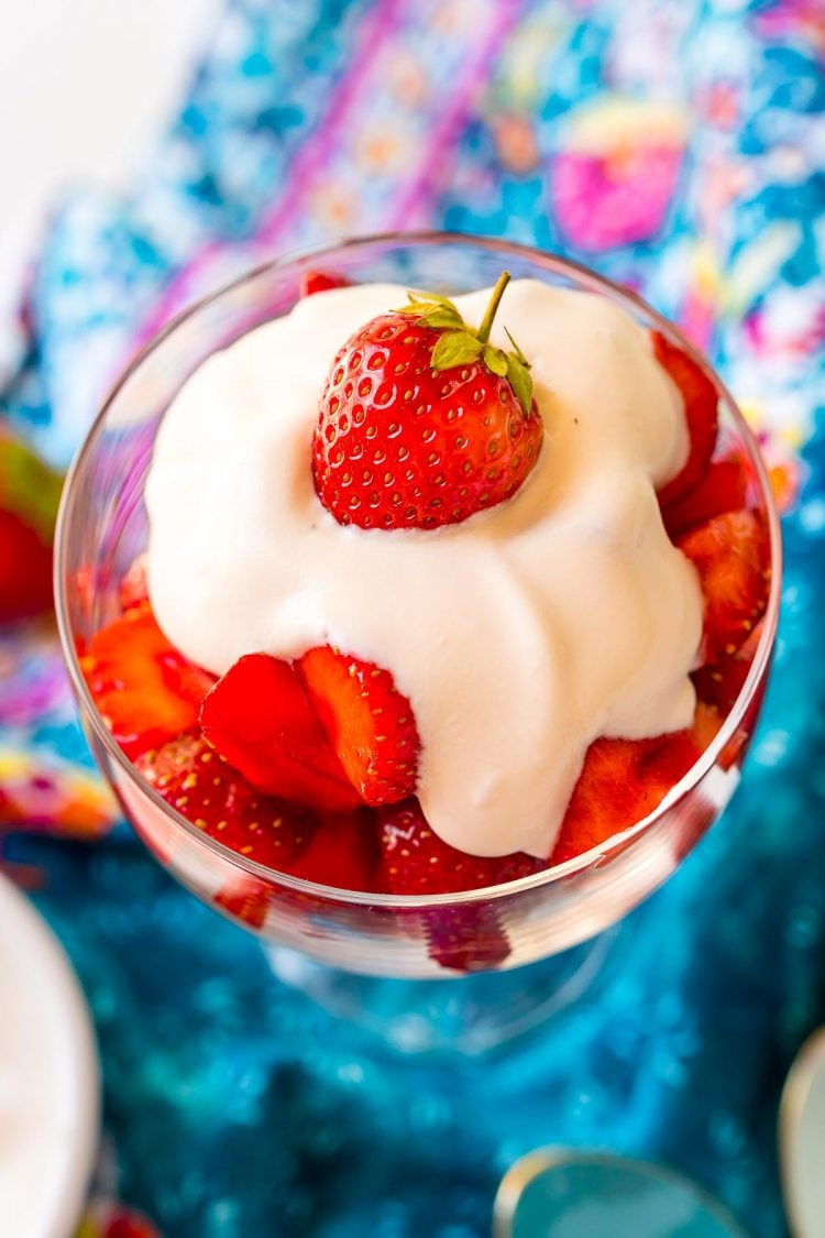 Close up photo of a dish filled with strawberries romanoff.