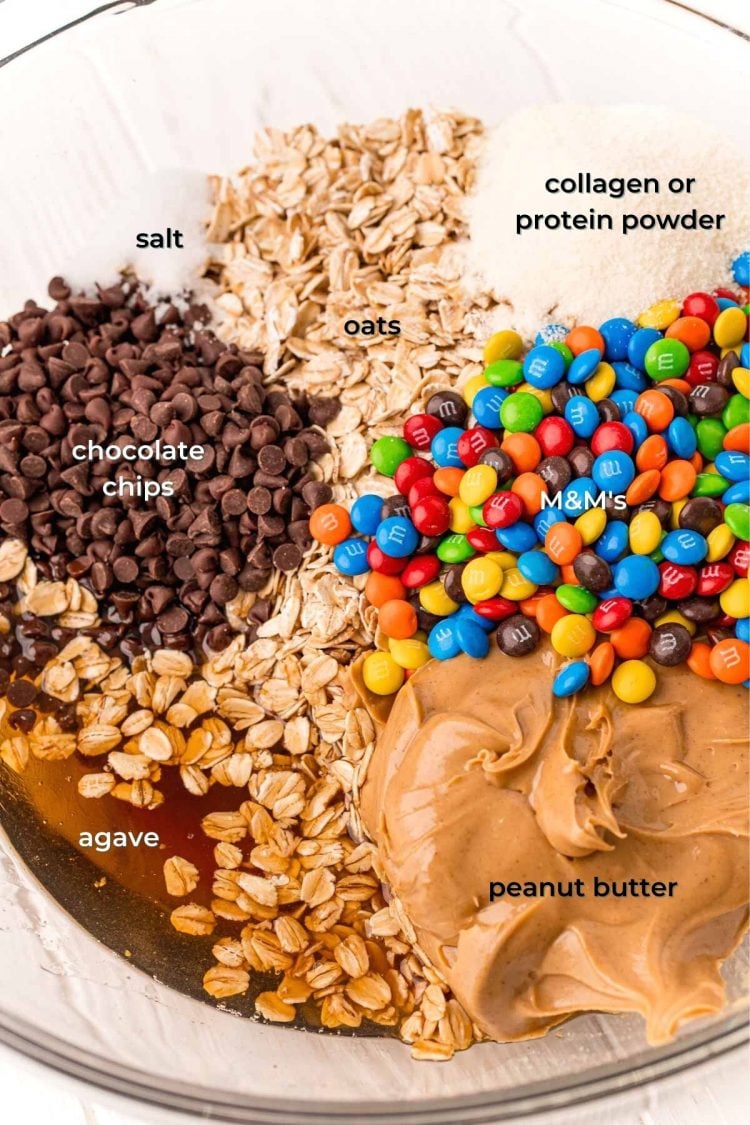 ingredients to make monster cookie balls in a mixing bowl.