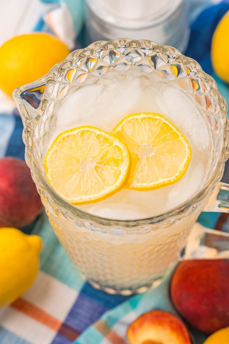 Close up photo of a pitcher or peach lemonade.