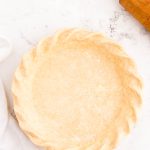 Overhead photo of a cream cheese pie crust ready to be baked.