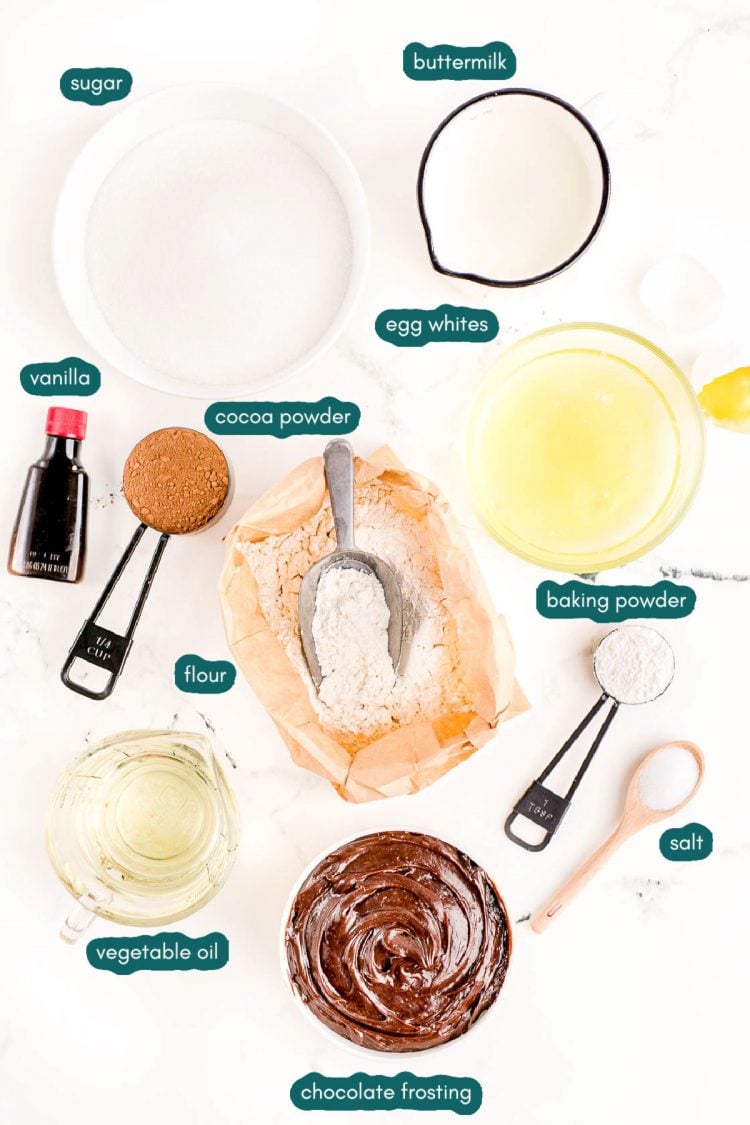 Overhead photo of ingredients prepped on a marble counter to make marble cake.