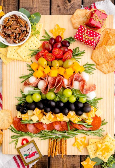Overhead photo of a Christmas Tree Charcuterie board on a wooden table.