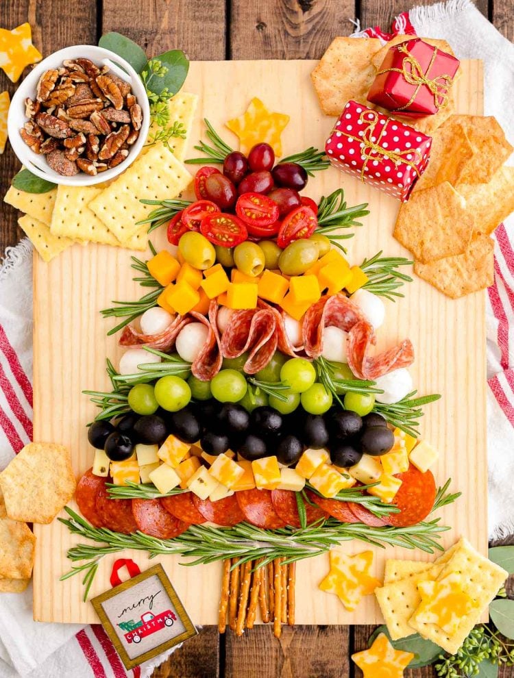 Overhead photo of a Christmas Tree Charcuterie board on a wooden table.