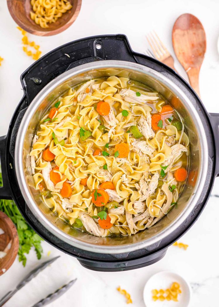 Overhead photo looking into an instant pot filled with chicken noodle soup.