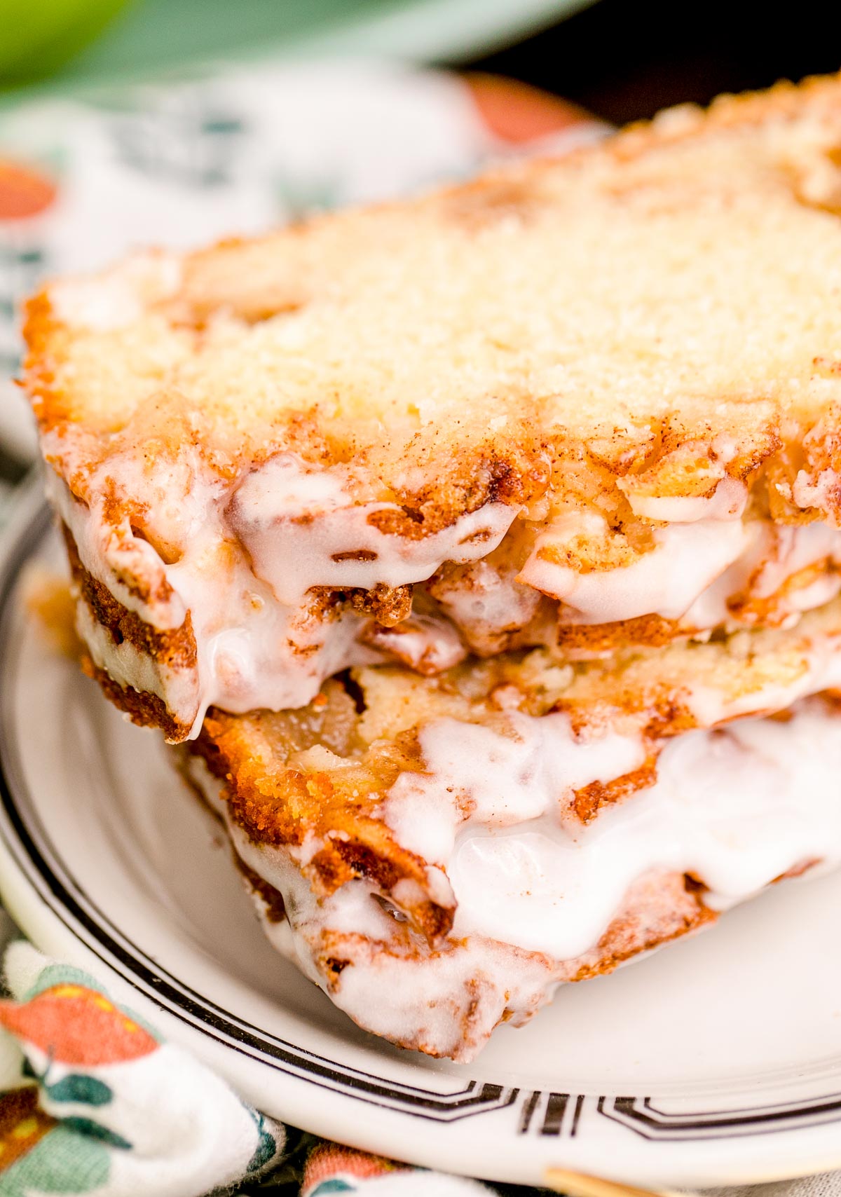 Slices of apple fritter bread on a white plate.