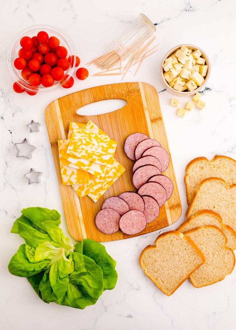 Overhead photo of ingredients to make Christmas tree appetizers. 