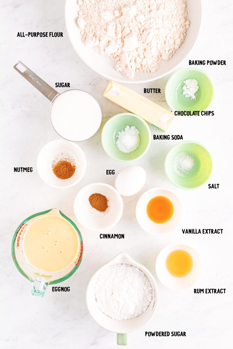 Overhead photo of ingredients prepped to make eggnog bread on a marble table.