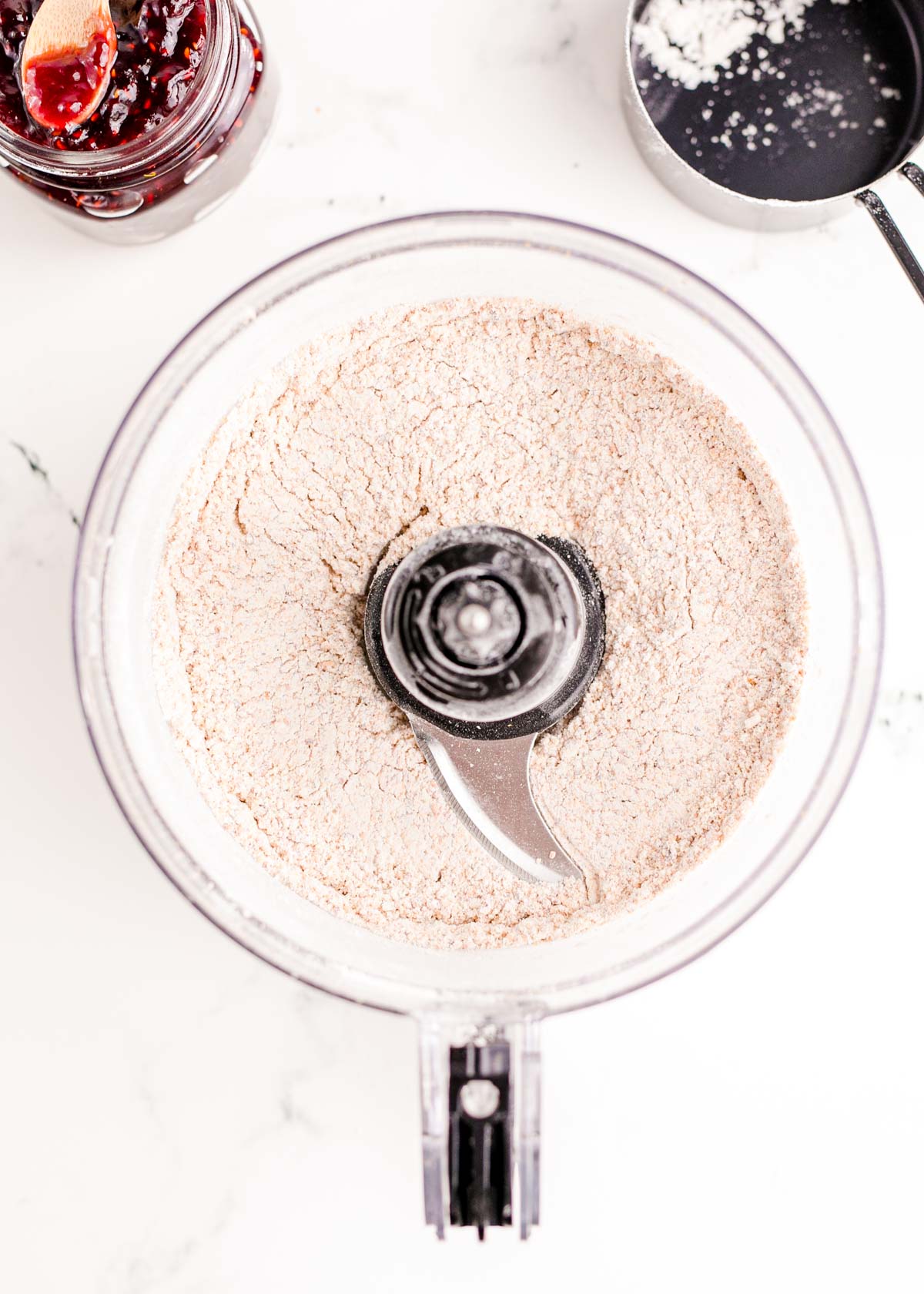 Almonds and flour mixed in a food processor.