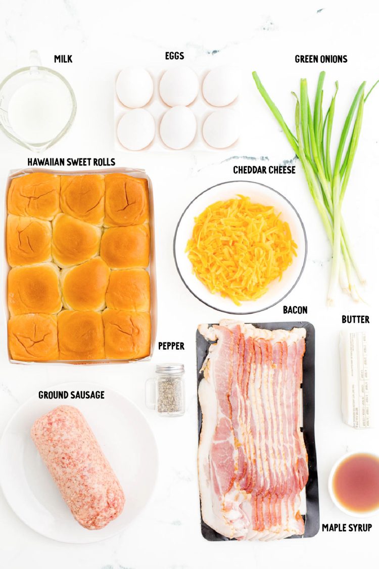 Overhead photo of ingredients to make breakfast sliders on a marble surface.