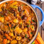 Overhead photo of a dutch oven filled with Irish beef stew.