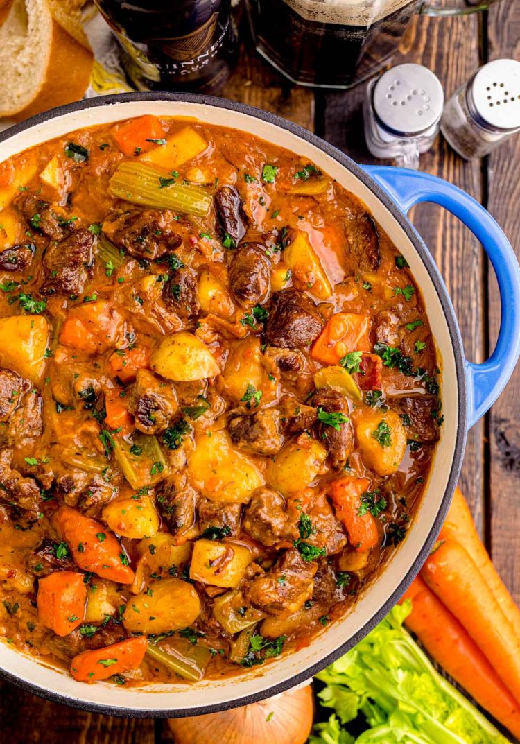 Overhead photo of a dutch oven filled with Irish beef stew.