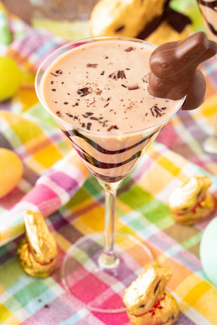 Close up photo of a chocolate easter bunny martini on a colorful napkin.