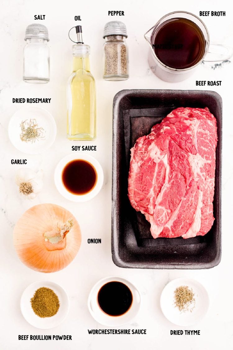 Ingredients to make beef french dip on a white table.
