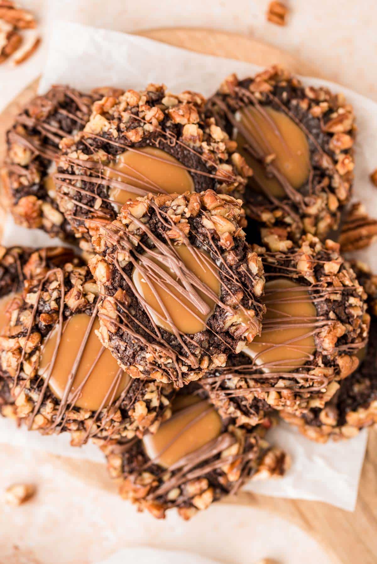 Turtle thumbprint cookies on a plate.