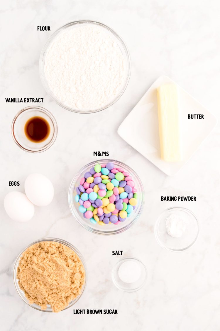 Ingredients to make Easter blondies on a marble counter.