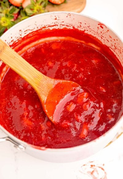 Close up photo of strawberry puree in a pot.