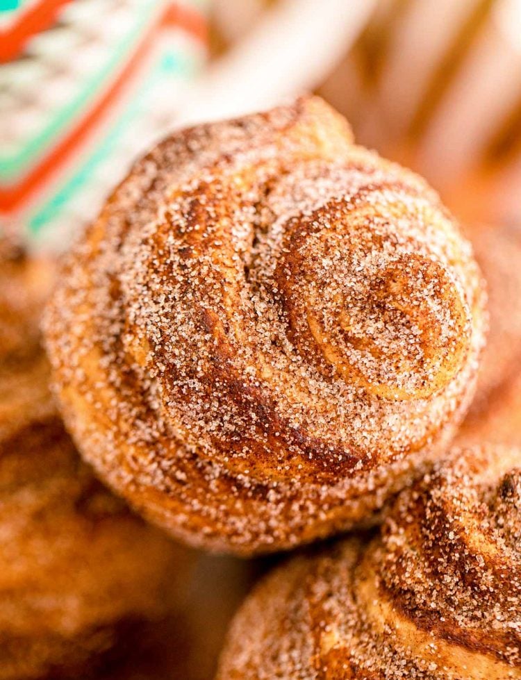 Close up of cinnamon sugar cruffins stacked.