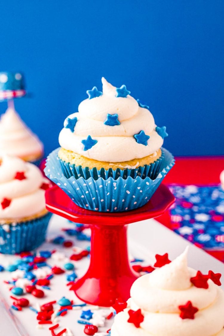 4th of July cupcake on a red cupcake stand.