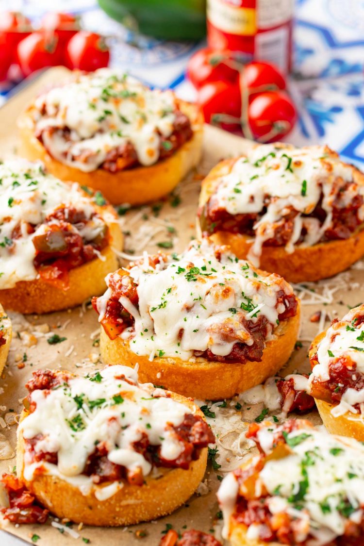 Texas Toast Sloppy Joes on a piece of parchment paper on a baking sheet.