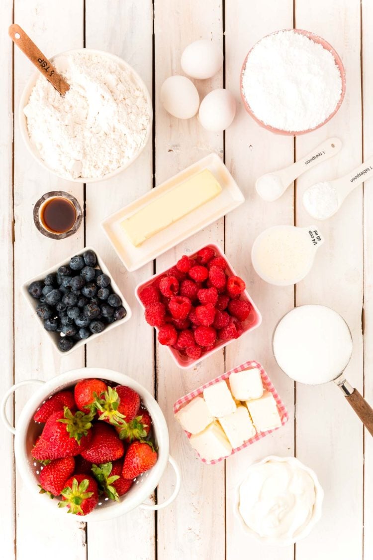 Ingredients to make shortcake cookies on a white wooden table.