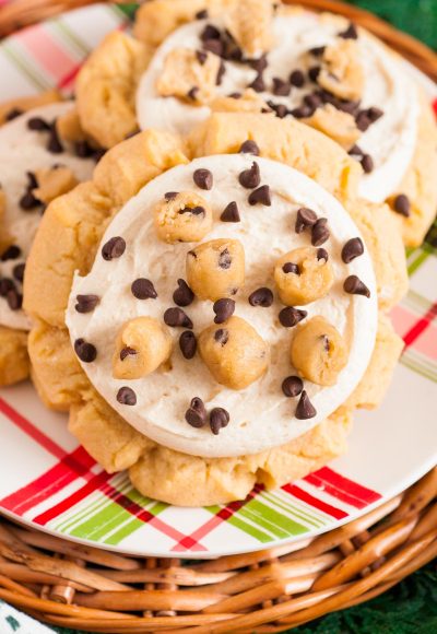 Close up of crumbl copycat cookie dough cookies on a red and green plaid plate.