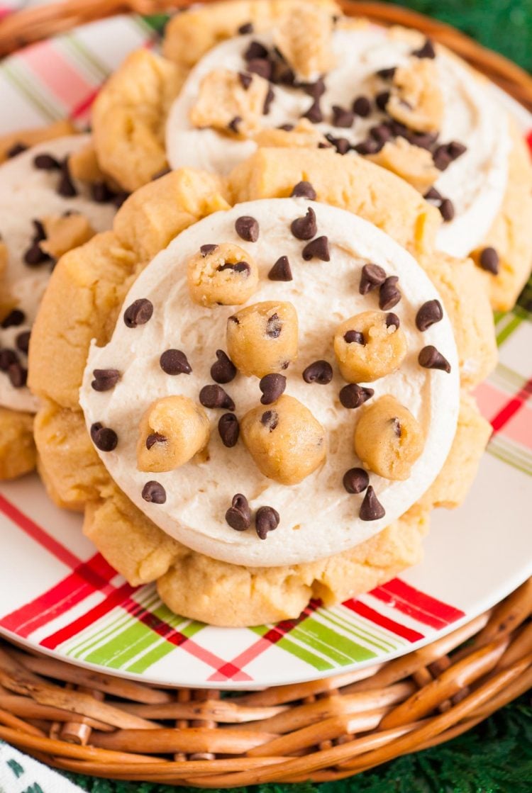 Close up of crumbl copycat cookie dough cookies on a red and green plaid plate.