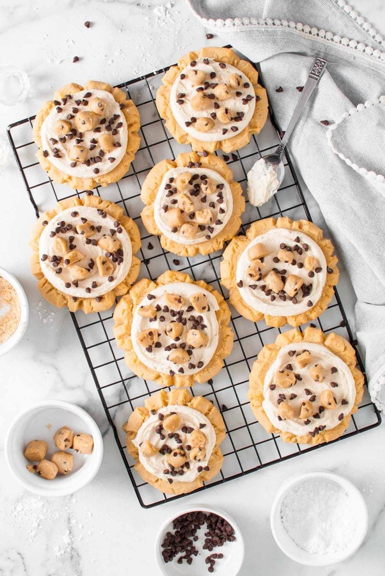 Overhead photo of crumble copycat cookie dough cookies on a wire rack.