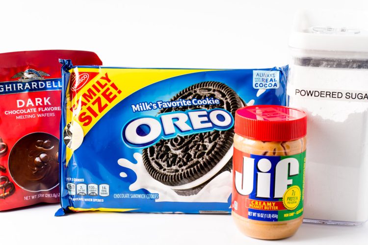 Ingredients to make Oreo Peanut Butter Balls on a white table.