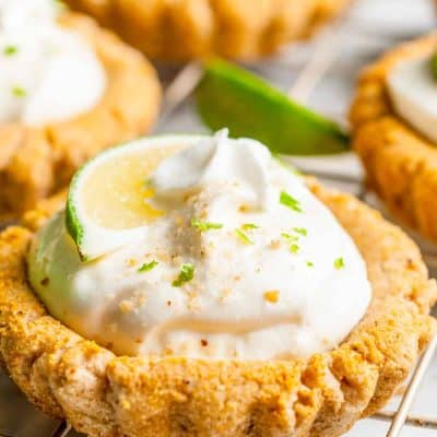 Close up photo of a Crumbl Copycat Key Lime Pie Cookie on a wire rack.