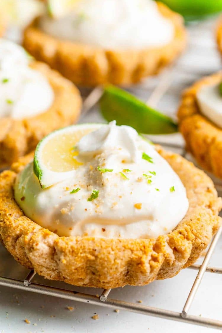 Close up photo of a Crumbl Copycat Key Lime Pie Cookie on a wire rack.