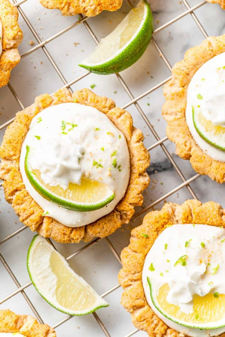 Overhead photo of key lime pie cookies on a wire rack.