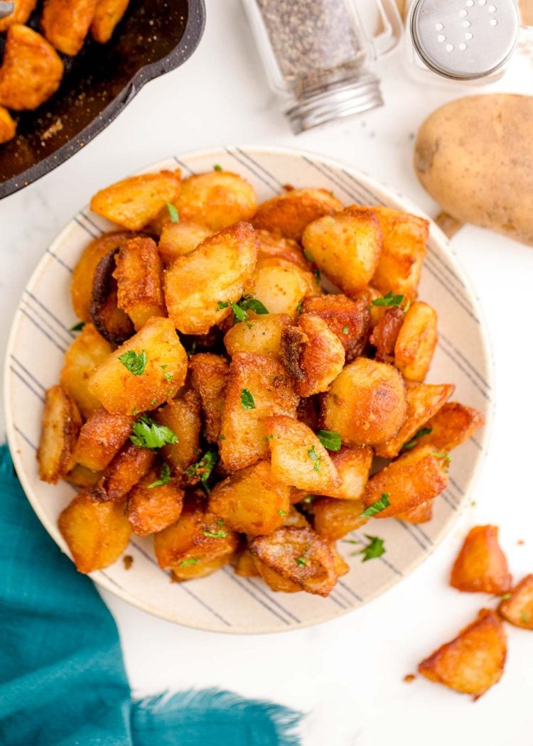 A plate full of duck fat potatoes.