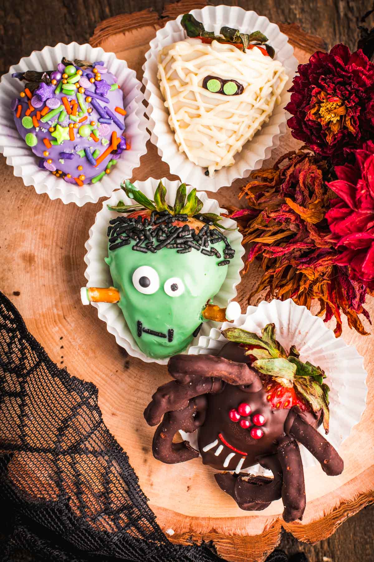 Overhead photo of Halloween decorated chocolate covered strawberries.